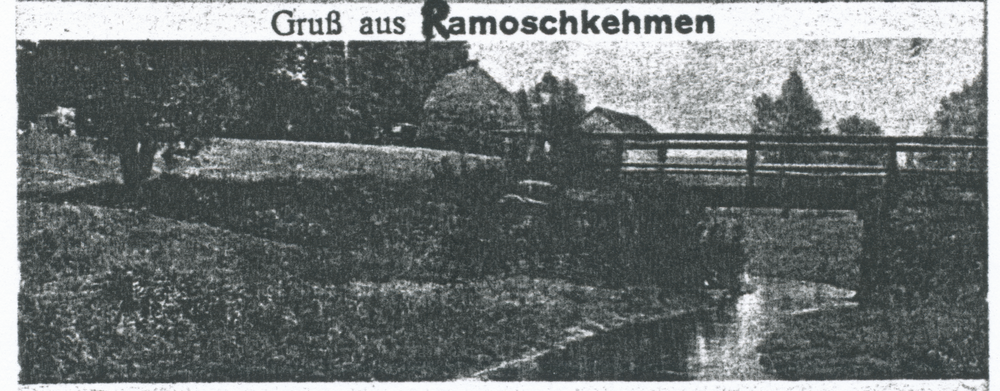 Ramoschkehmen, Ortsteilansicht mit Brücke über den Fluss