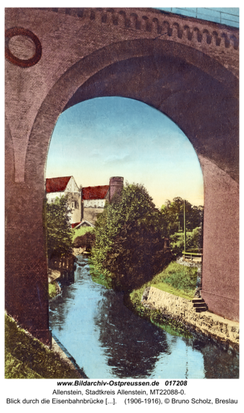 Allenstein, Blick durch die Eisenbahnbrücke auf das Schloss