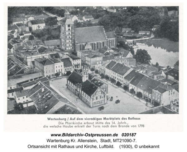 Wartenburg, Ortsansicht mit Rathaus und Kirche, Luftbild