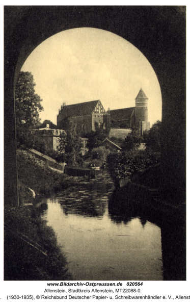 Allenstein, Blick durch die Eisenbahnbrücke zum Schloß