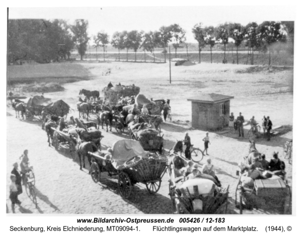 Seckenburg,  Flüchtlingswagen auf dem Marktplatz