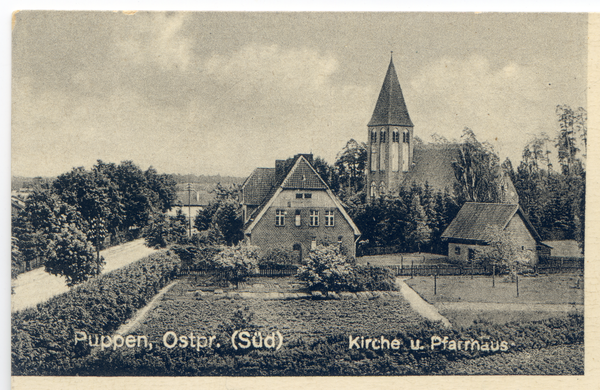 Puppen, Kirche und Pfarrhaus